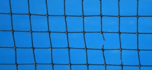 Tennis net with one broken piece